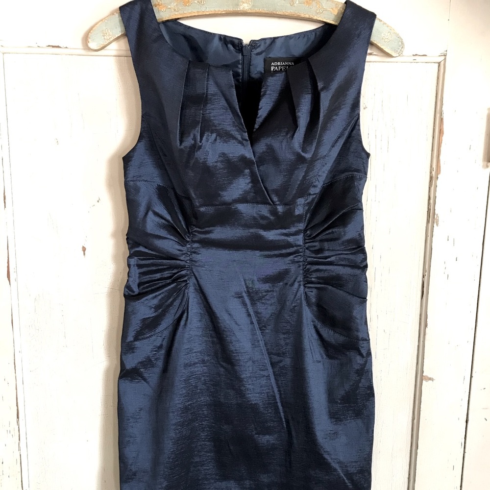 Adriana Papell body hugging iridescent blue dress